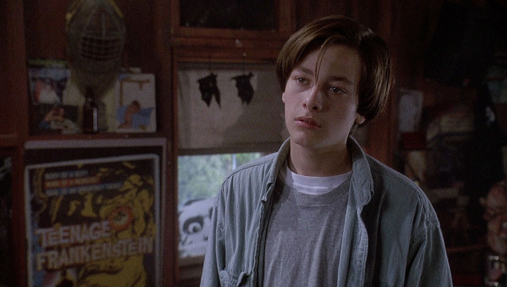 teenage Michael looking blank and drained