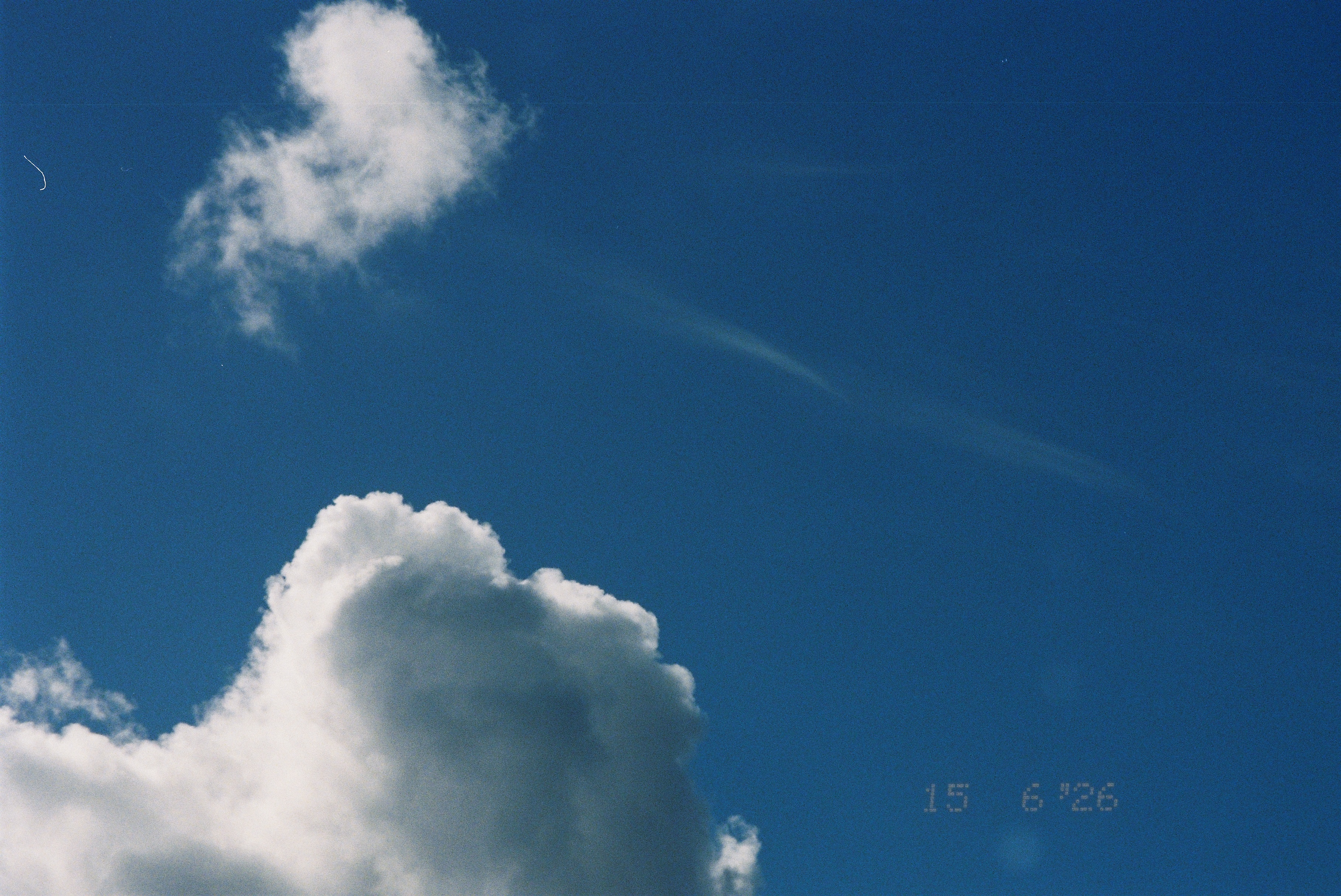photo of clouds in a blue sky