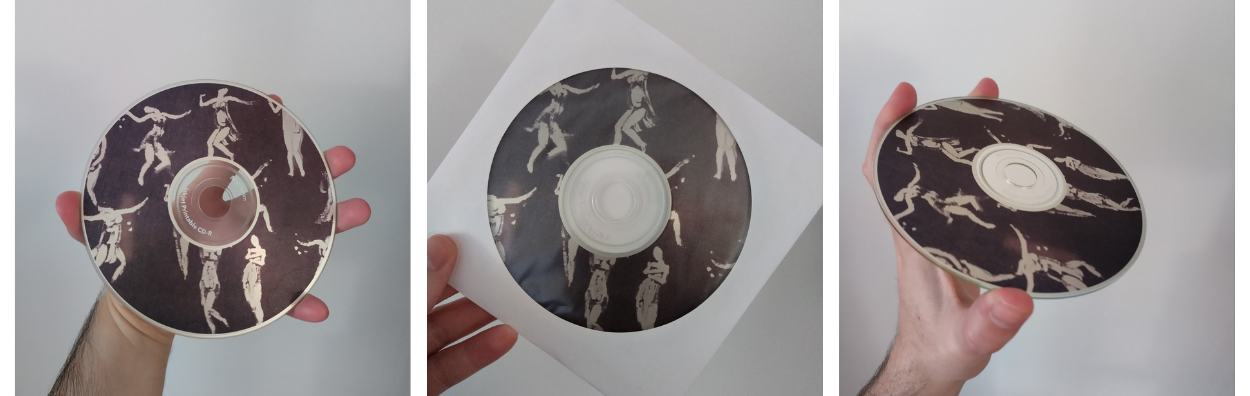 CD with black and white printed image of dancers