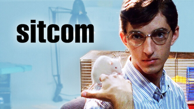 boy with glasses and a rat on his shoulder (from sitcom)