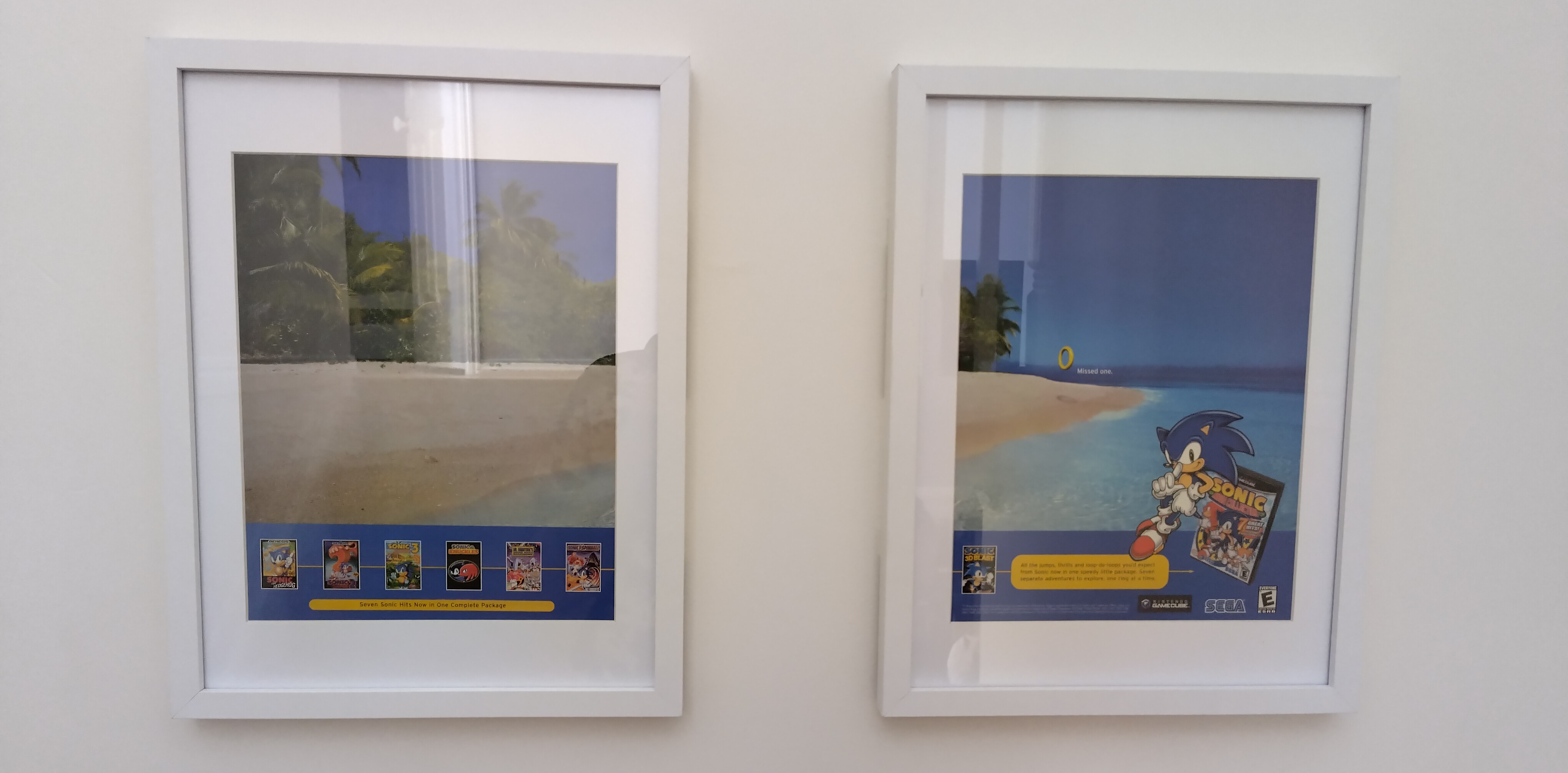 photo of two sonic advertisements framed on a wall